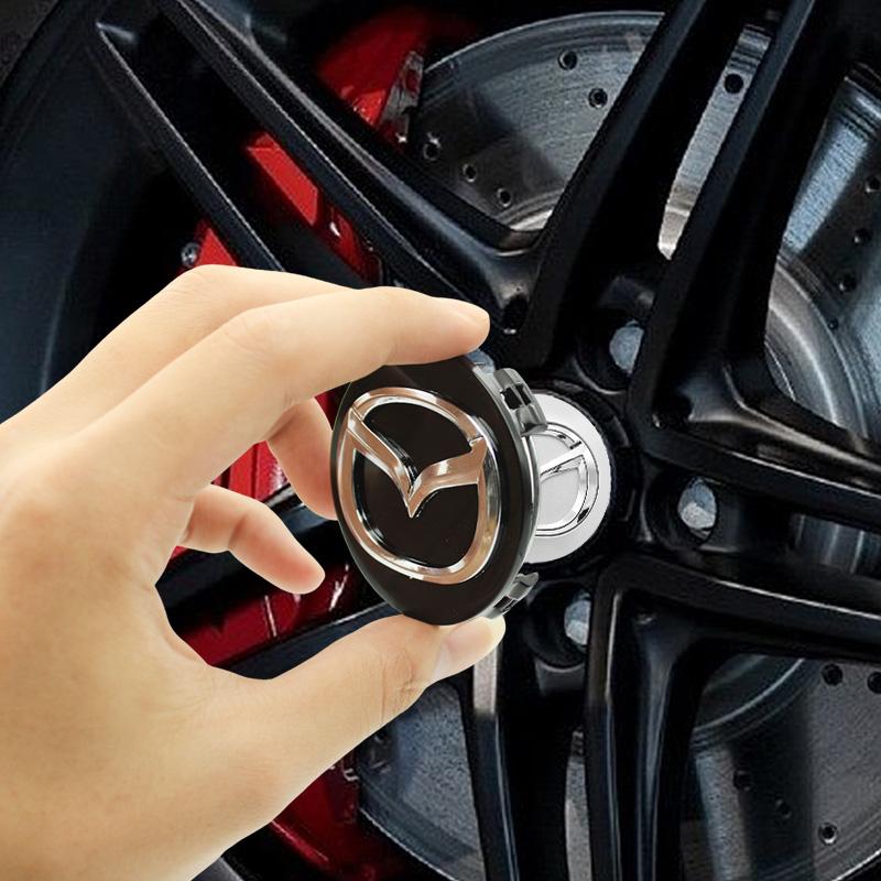 4pcs 56mm Car Wheel Center Cover Hub Cap Badge Emblem Auto Accessories For Mazda 3 6 2 5 Atenza Axela Demio CX3 CX5 CX-5 MS RX8 k1