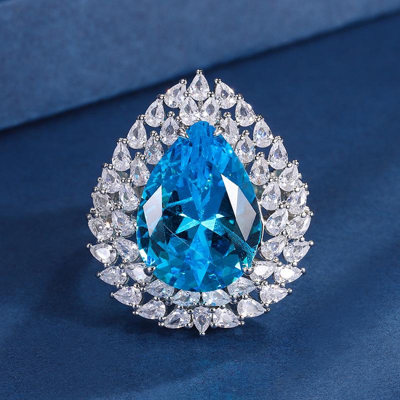 

Ювелирный набор Симуляция Розовый бриллиант Аквамарин Подвеска Кольцо Главный камень 13 * 18