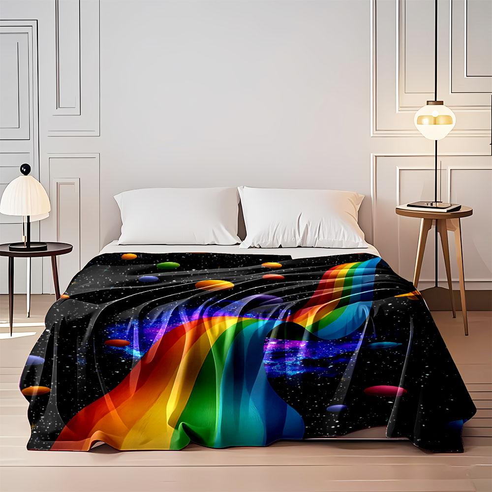 A flowing rainbow ribbon amidst colorful planets and a starry cosmic backdrop. for all seasons blanket lunch break throw gift