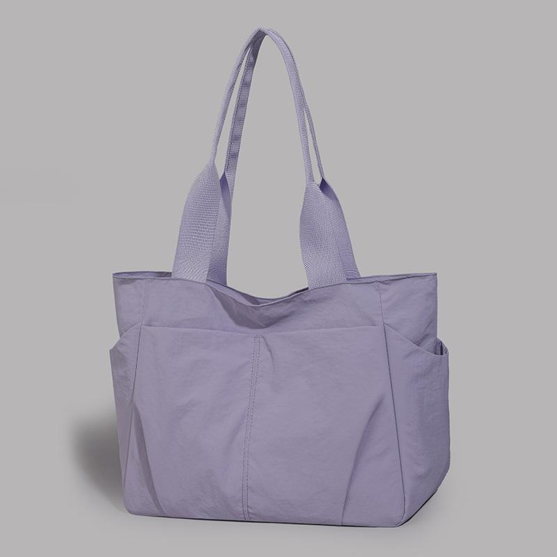 Large-capacity simple casual shoulder bag women's new versatile lightweight tote bag class commuter bag
