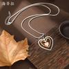 New matte three-layer hollow heart long pendant, women's hollow rotating heart-shaped versatile long necklace