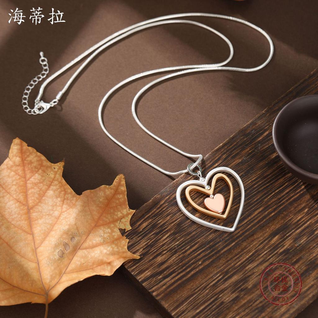 New matte three-layer hollow heart long pendant, women's hollow rotating heart-shaped versatile long necklace