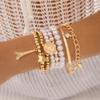 Korean Version of Multi-element Eiffel Tower Pearl Retro Bracelet, Coin Six-piece Jewelry Multi-layer Elastic Bracelet