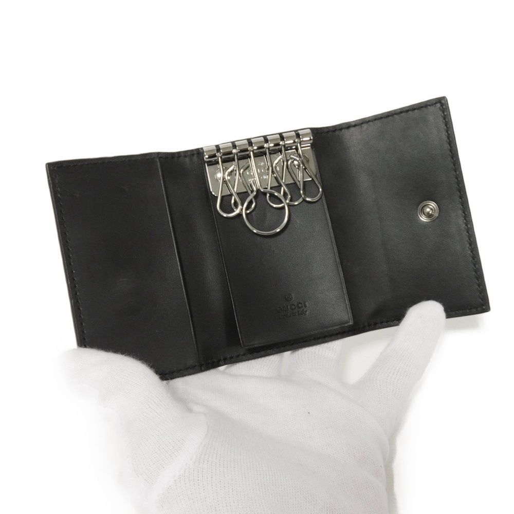 Used Guccissima 6-ring keychain (138093 7949) with double G embossing (9539) in black. Unisex. from Japan AUTHENTIC