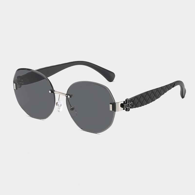 Women's Egg-Shaped Stylish Frameless Retro Sunglasses for Summer Photoshoots