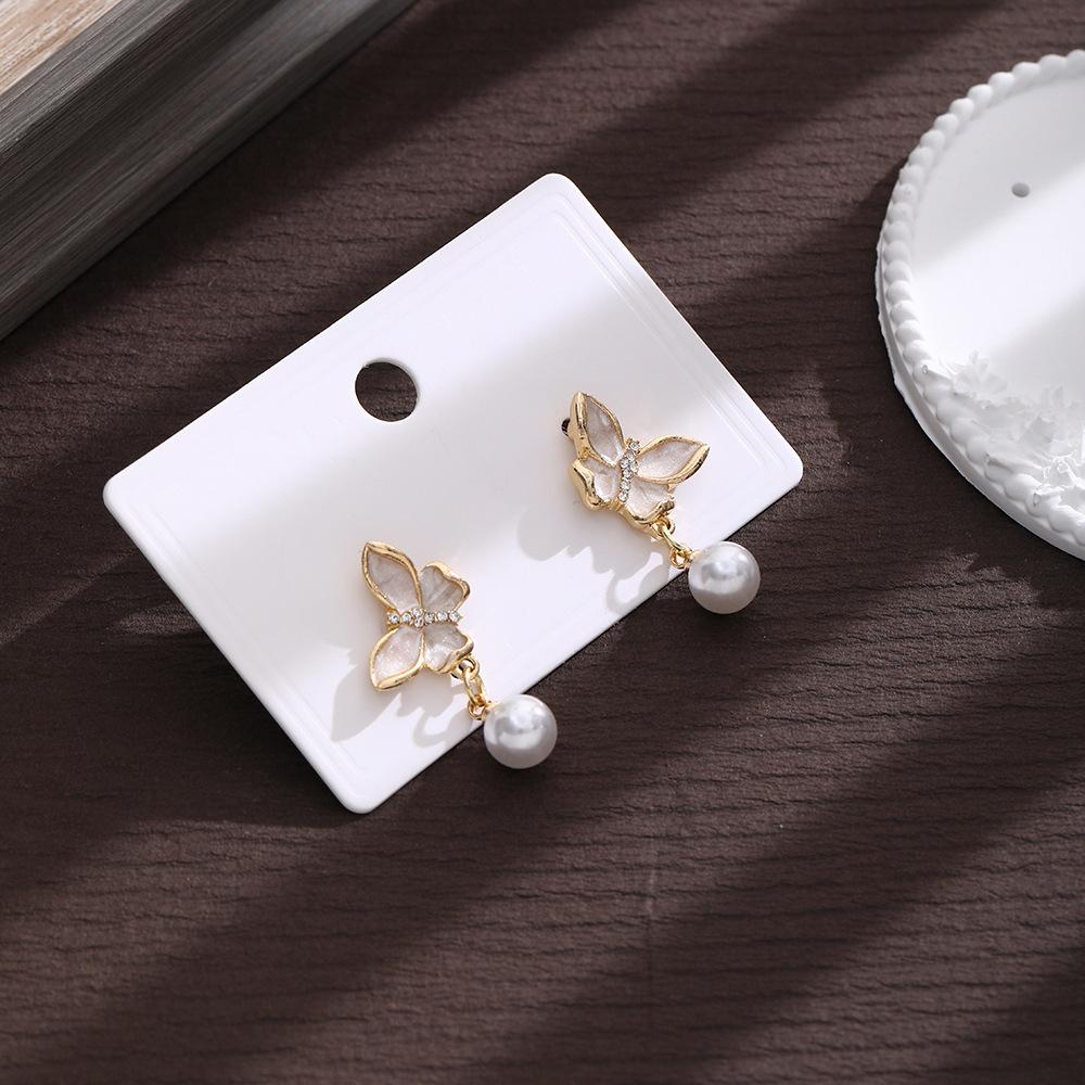 High-End Flower Stud Earrings, Light Luxury Super Fairy Exquisite Pearl Earrings, Fashionable Oil-Dripping Petal Earrings.