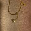 Used Q-POt banana chocolate necklace