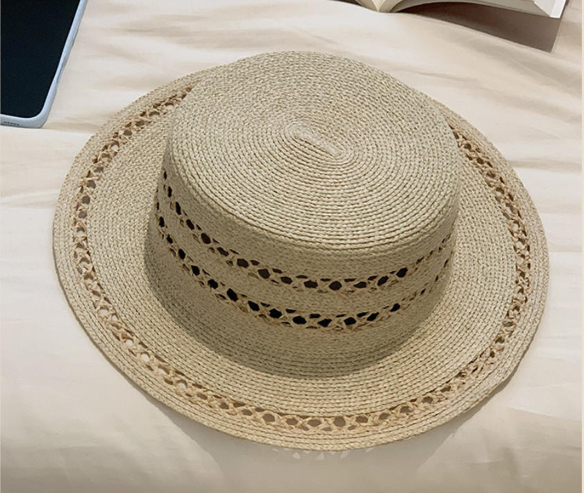 Hand-woven flat-top Lafite straw hat women's summer new hat hollow sunshade sunscreen hat French top hat