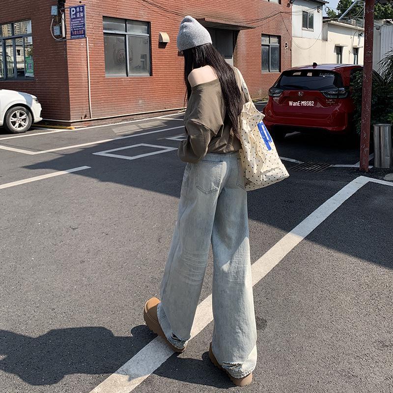 Damskie postarzane retro amerykańskie dżinsy: Jesień 2025 Luźne Szerokie Nogawki z Designem Drapanym