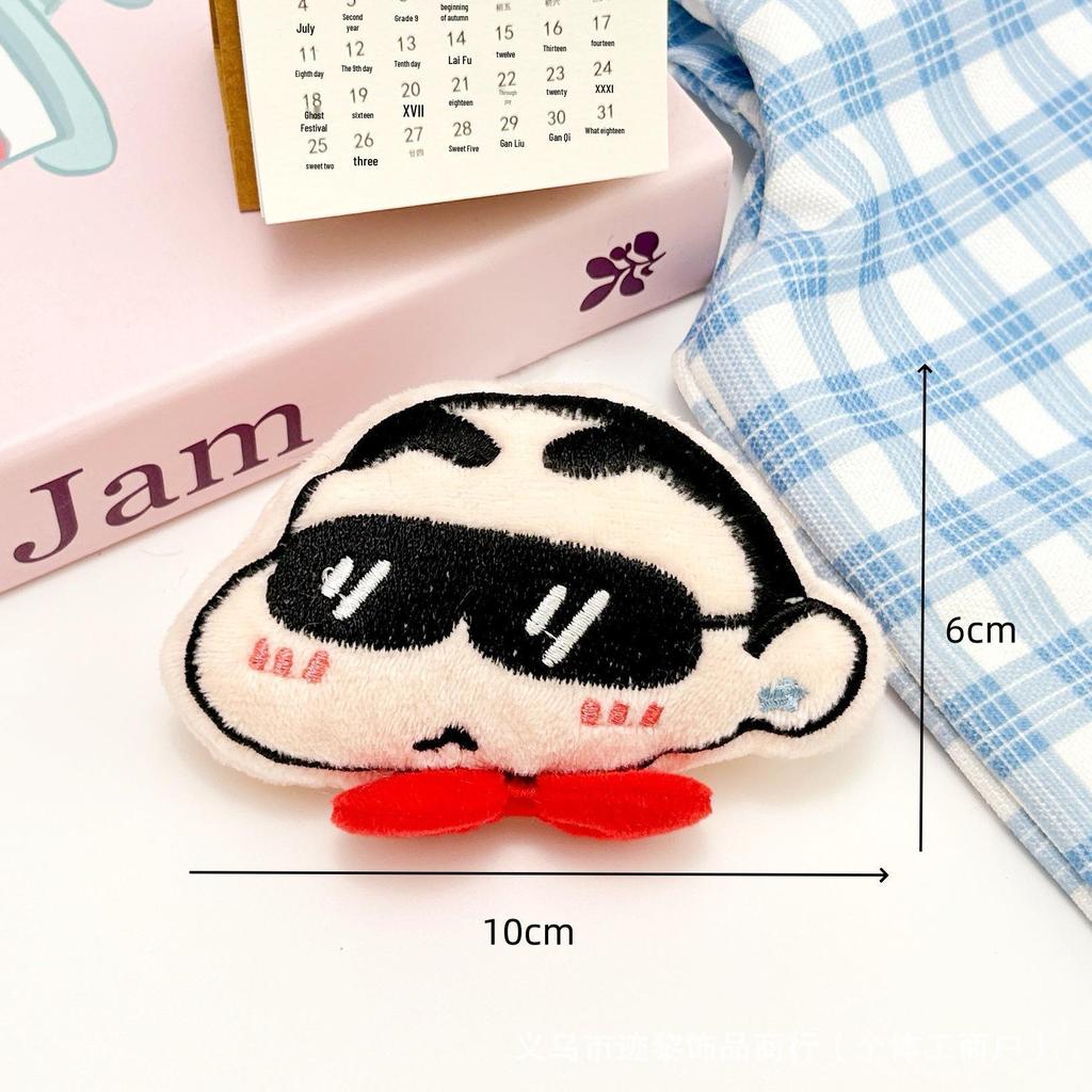 Cute Crayon Shin-chan Squeaky Plush Pendant with Cartoon Sunglasses, Masao Doll Brooch, and Shin-chan Accessories.