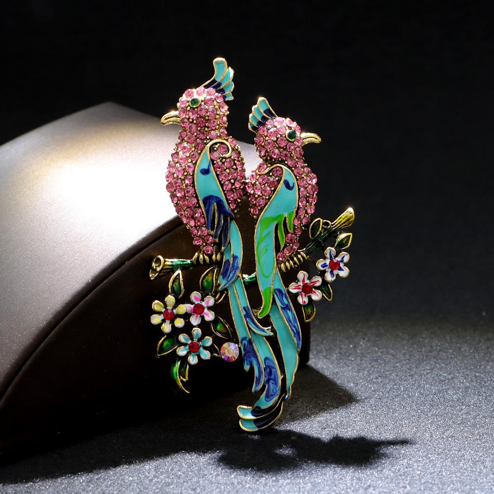 

Брошь с бриллиантовой эмалью в виде птицы Феникс Павлин Зимняя одежда Универсальный корсаж Элегантный темперамент Соответствие розовый