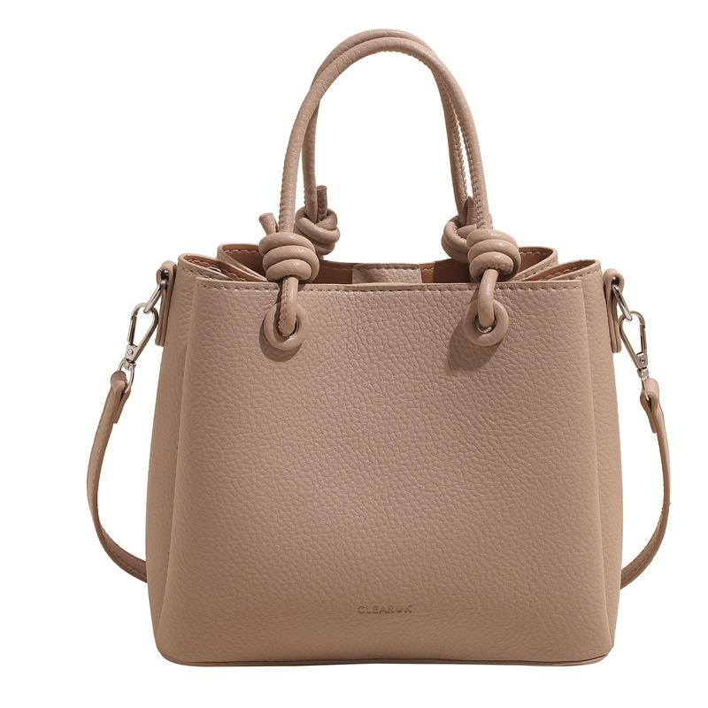 

Spring and summer hot sale simple solid color lychee pattern portable bucket bag women s commuting temperament casual shoulder messenger bag