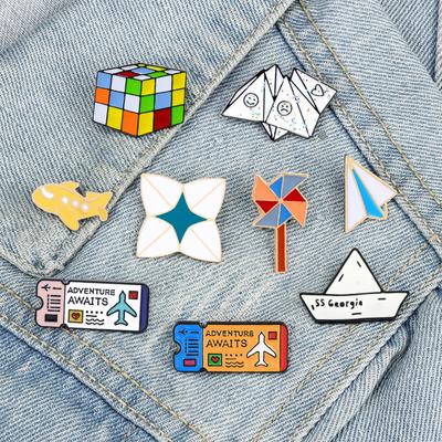 Aparatos de costura y tejido – Insignias