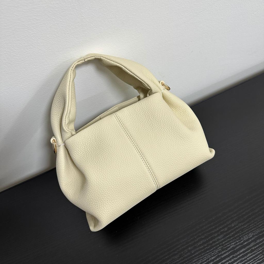 Haute couture first layer cowhide pleated cloud bag niche high-end handbag oblique span shoulder bag women's 2025 new