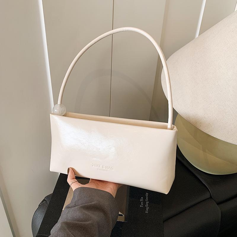 New Women's Red One Shoulder Bag Summer Large Capacity Solid Color Underarm Bags Trend Textured Commuting PU Handbags