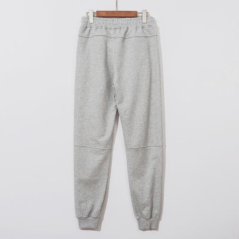 Funktionelle, einfarbige Unisex-Sport-Jogginghose mit Reißverschlusstaschen