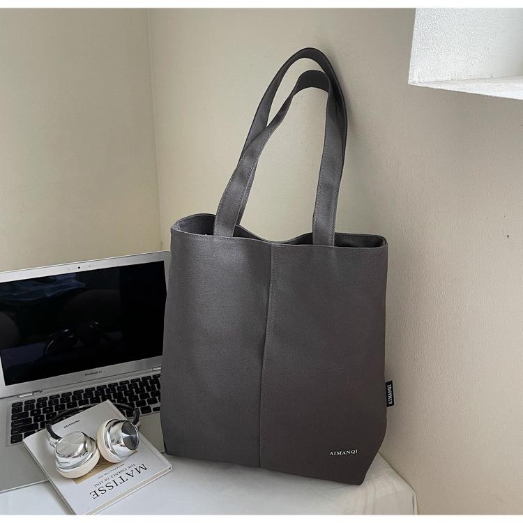 Fashion trend casual simple large capacity canvas bag 2025 summer new foreign style women shoulder tote bag