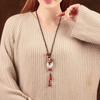 GEMCHIC Women's Vintage Ethnic Style Long Sweater Necklace with Glass Ping An Buckle Pendant and Red Beads