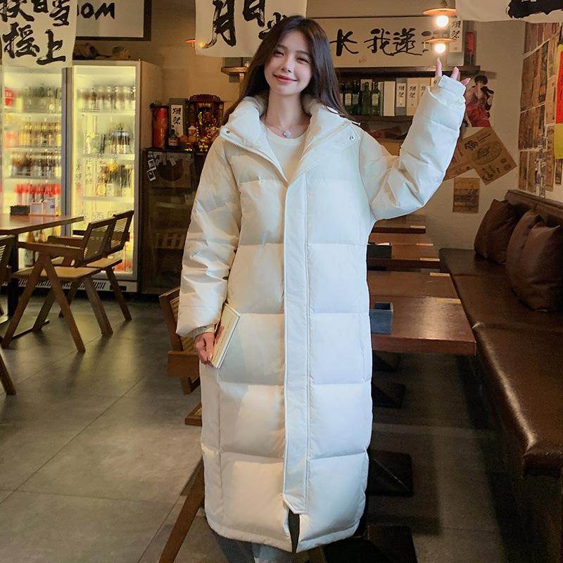 

Пуховик женский удлиненный свободный зимний с капюшоном S бежевый