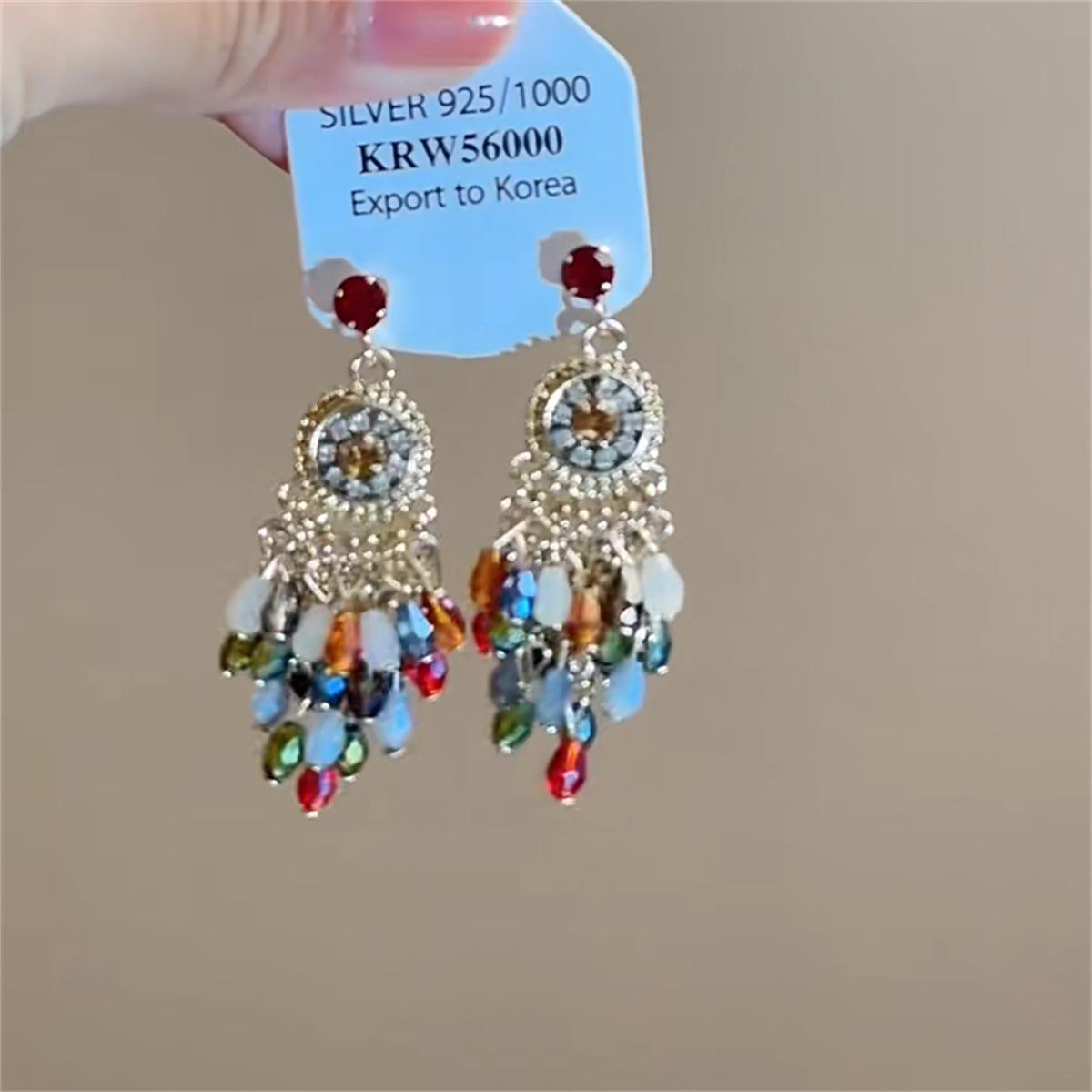 

Серьги-кисточки с цветком, инкрустированным бриллиантами Серебряная игла - Элегантные и модные серьги-пусеты высокого класса с уникальным дизайном