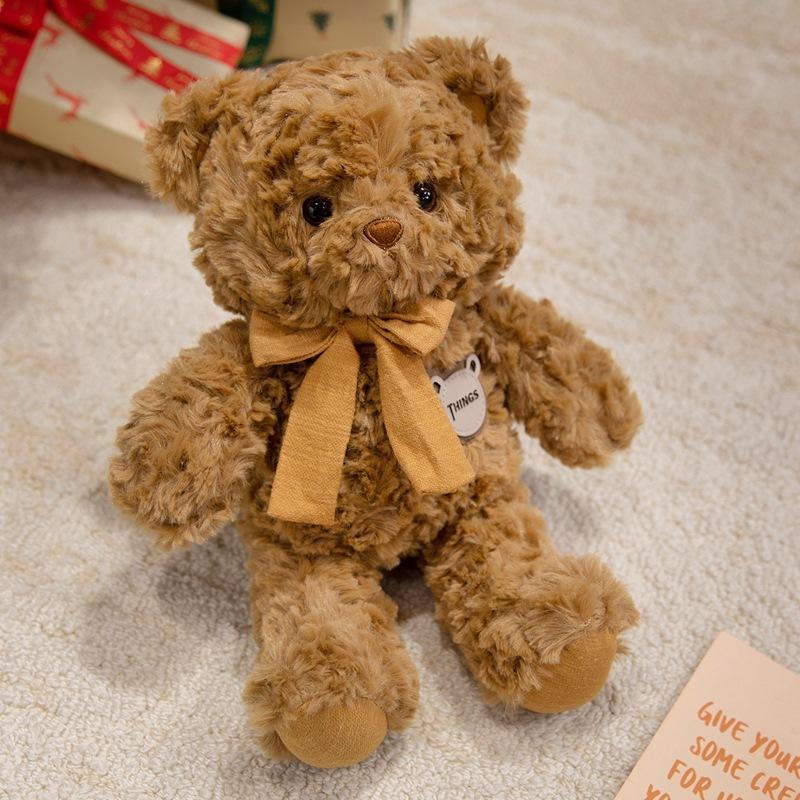 

Милый бант медведь обнимает медведя кукла плюшевая игрушка плюшевый мишка кукла детская компания успокаивающая кукла 32cm（0.25kg） темно-коричневого