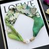 Lazy magnetic buckle silk scarf women's spring and autumn thin neck protection magnetic buckle silk scarf long small collar versatile pearl necklace