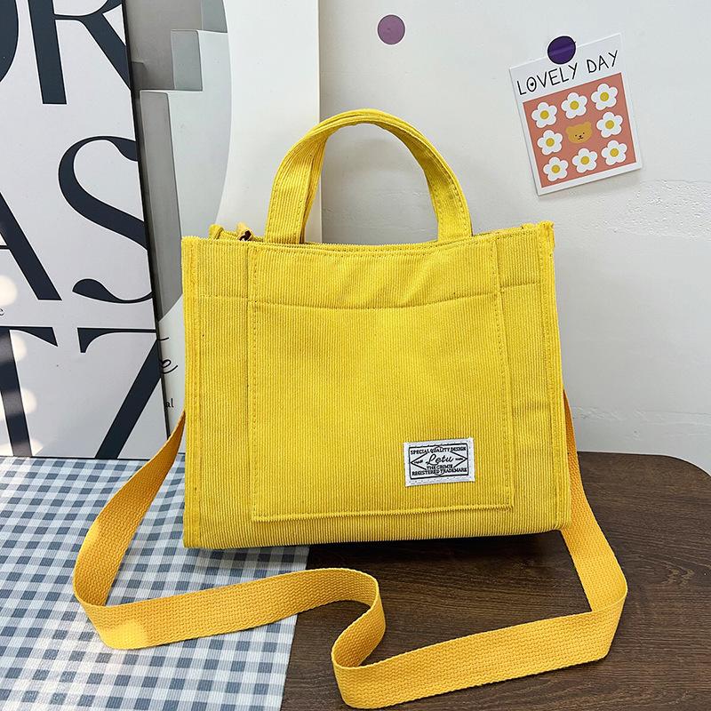 

2026 new corduroy shoulder lunch box bag simple oblique span bag trend 20*25*10 жовтий