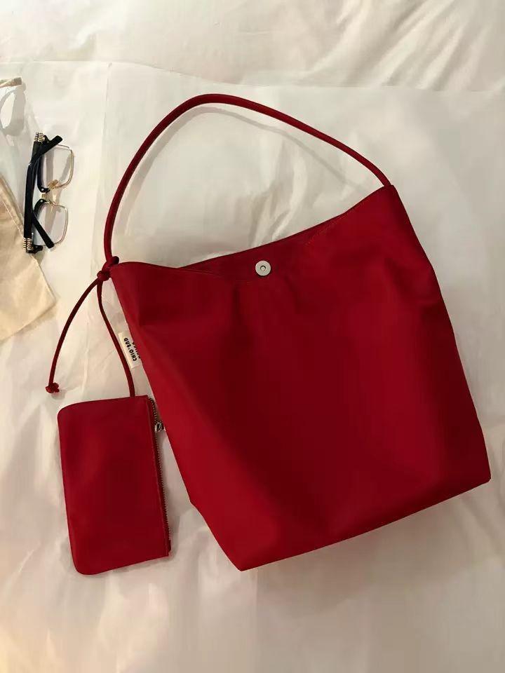 

Nanfeng Versatile Trend Time Traveler Tote Bag Women s 2025 New Commuter Slack Handheld Shoulder Bag