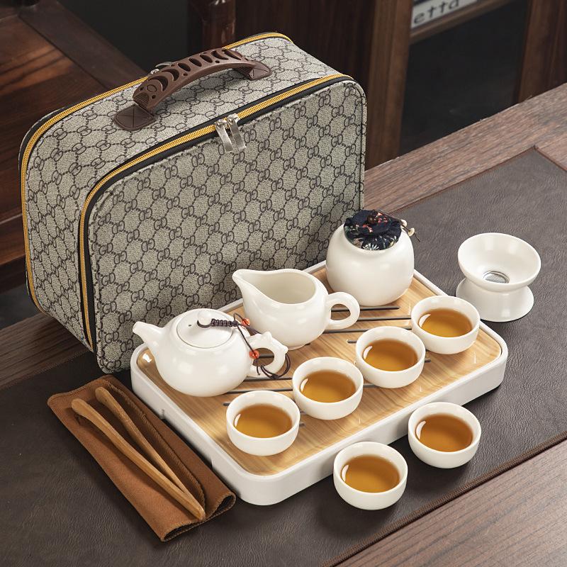 Travel ceramic Kung Fu tea set, tea tray, a full set of portable storage bags, practical business gifts for customers