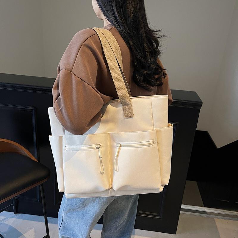 Casual Large-capacity Canvas Bag Women's New Versatile Multi-pocket Shoulder Bag Commuter Tote Bag