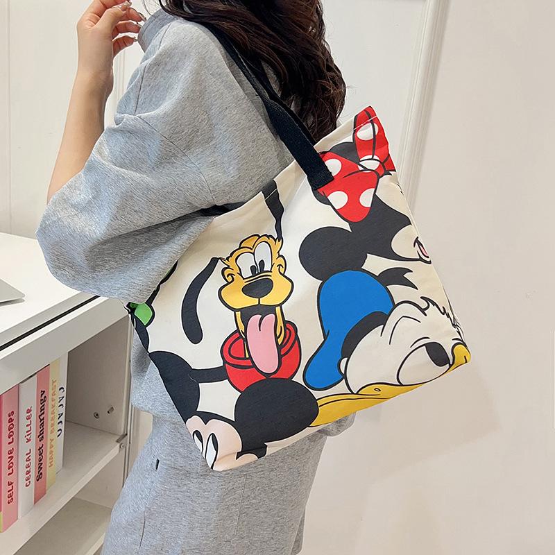 High-value canvas bag large-capacity cute cartoon interstellar baby student clothing book shoulder bag portable shopping bag female