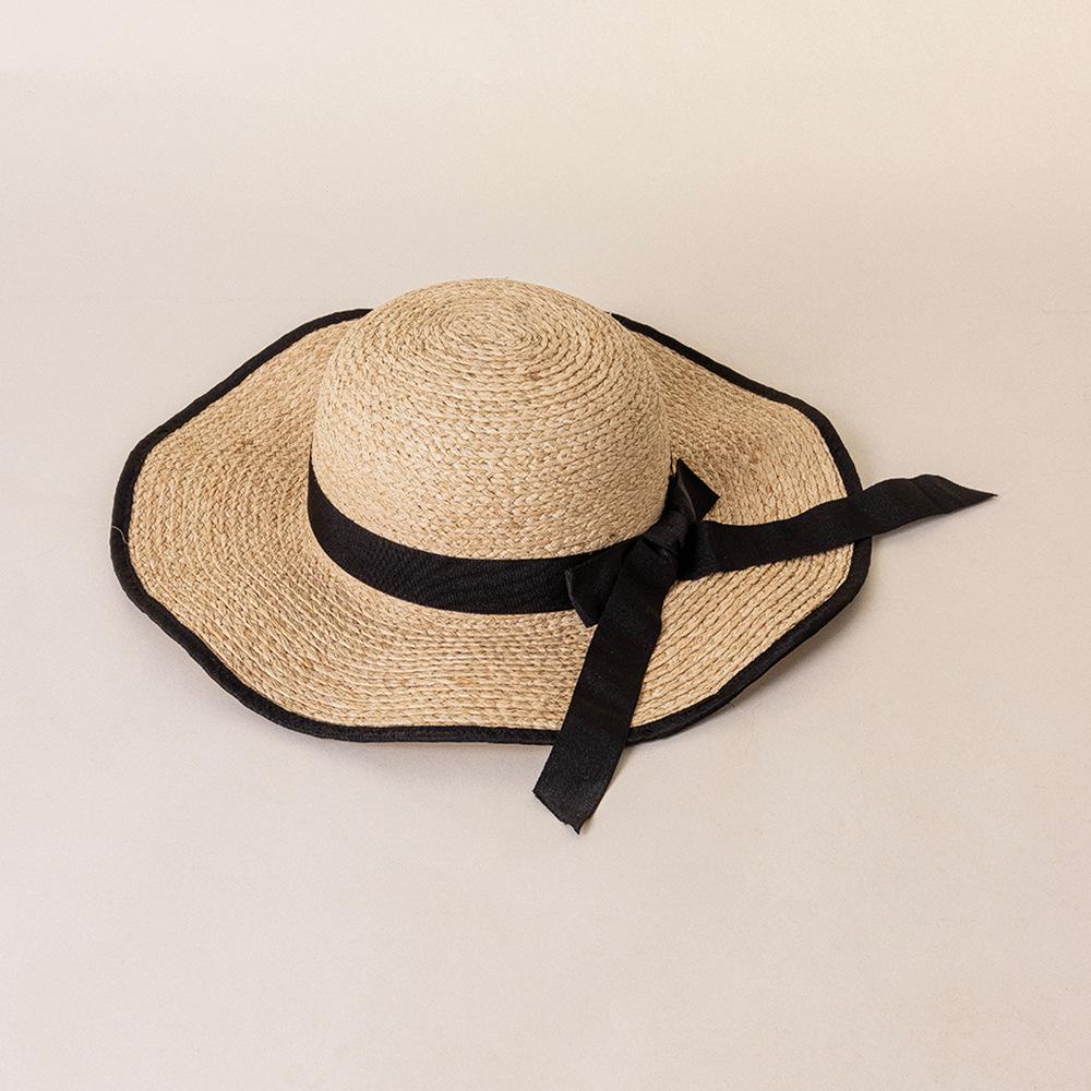 Spring and summer new bow raffia large brim black edge wavy brim fashion leisure beach travel sun protection