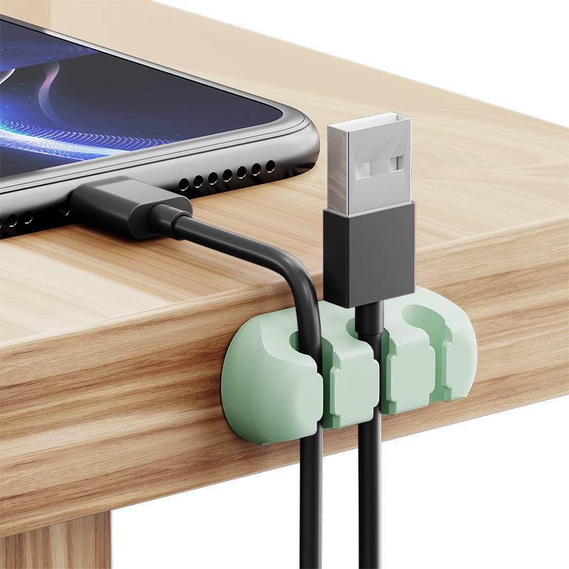 Wall mountable self-adhesive silicone cable organizer multi-functional cable winder earphone cables phone data cables wires