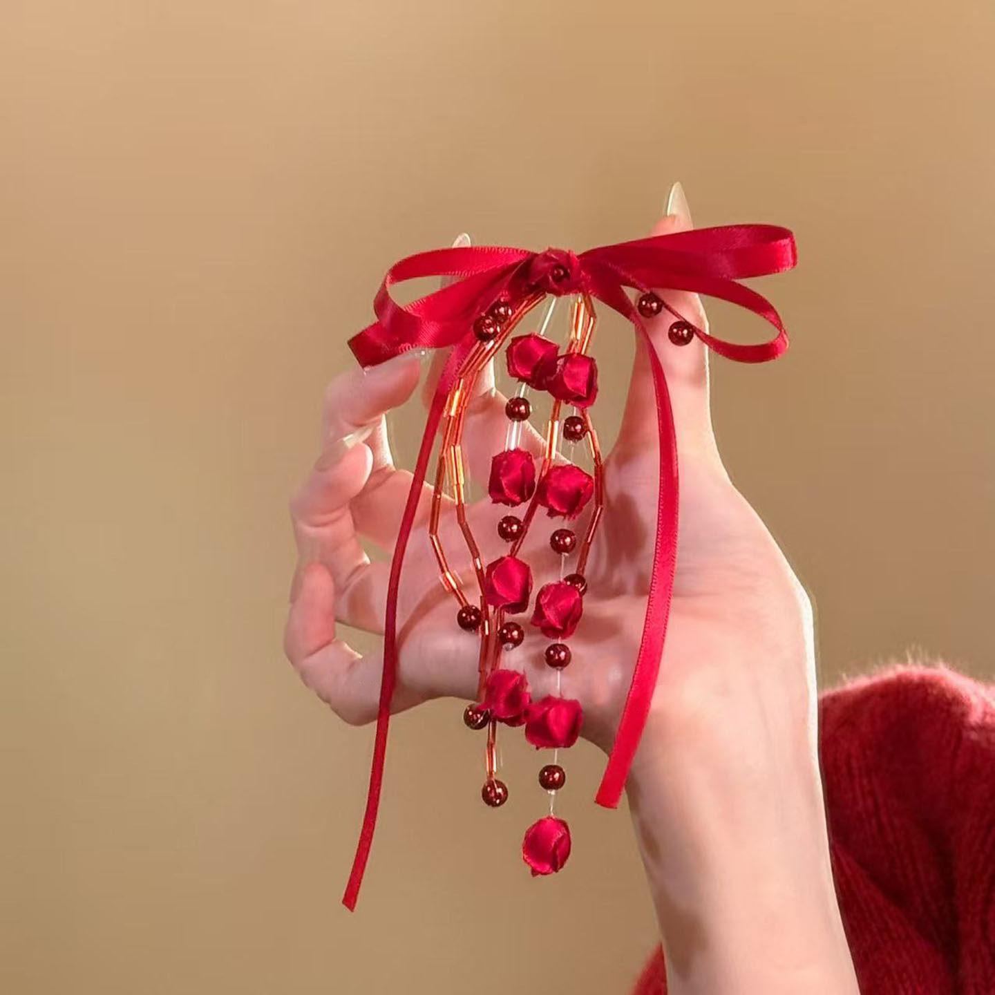 

New Year s red ribbon bow pearl flower fringed earrings sweet stud earrings