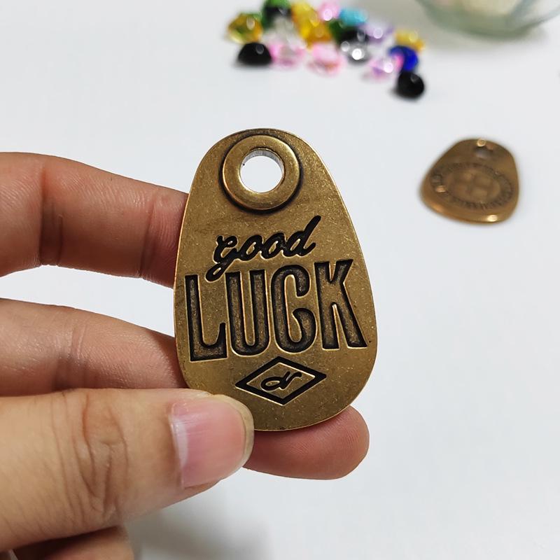 Lucky Brass Keychain Pendant: Decorative Good Luck Copper Zipper Bag Accessory.