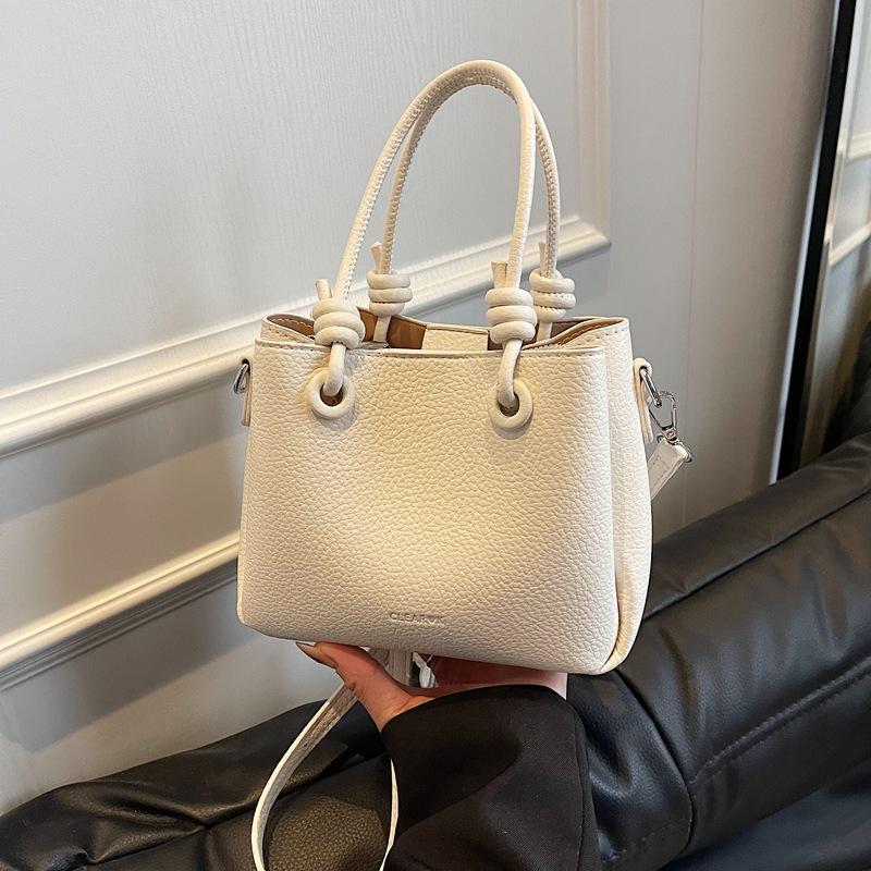 Portable versatile casual bucket bag 2025 spring new Korean version fashion high-end shoulder bag commuter messenger bag