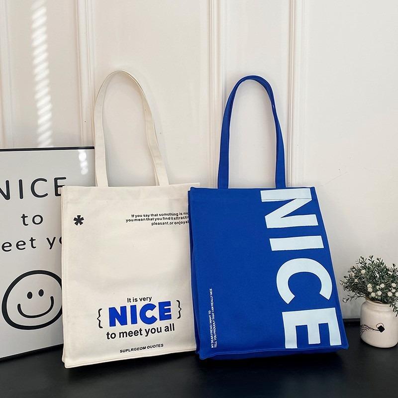 Modieuze draagtas Nieuwe vrouwelijke student make-uptas Canvas tas Dagelijkse pendeltas Grote capaciteit okseltas