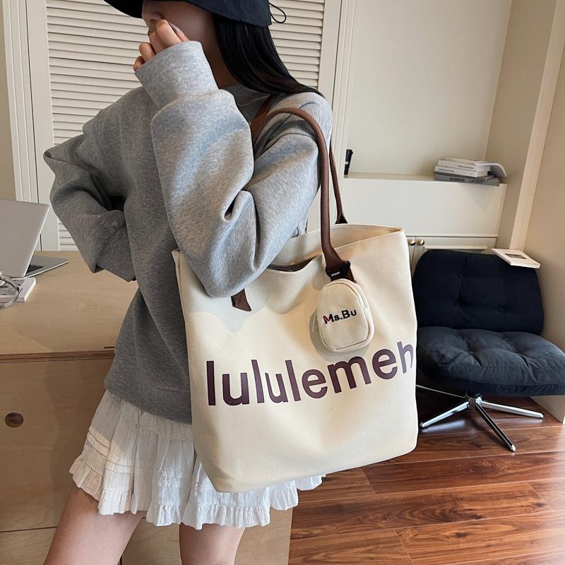 2025 summer new canvas bag shopping bag lazy wind tote bag commuter large capacity cloth bag portable shoulder bag