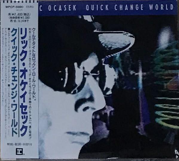 

CD РИК ОКАСЕК - Quick Change World WPCP5690 Reprise Records 1993 Япония Рок Б/У