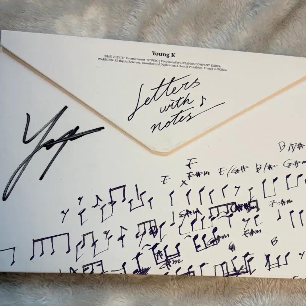 Young K's signed album Letters with Notes