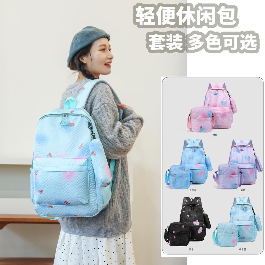 Schoolbag men's and women's new large-capacity backpack, embossed three-piece backpack for junior high school and high school students