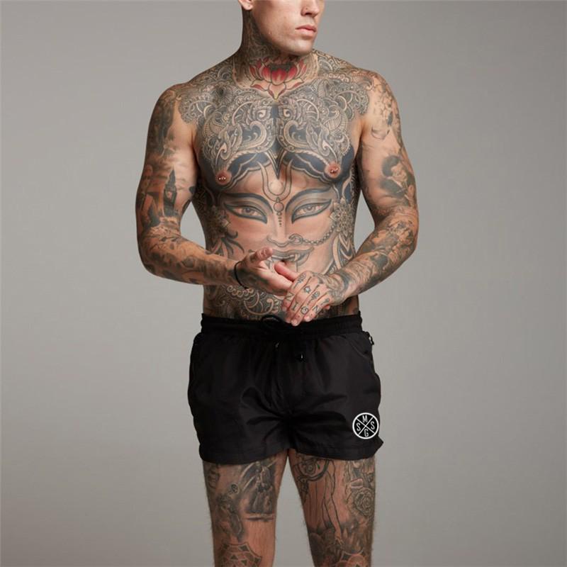 Muscleguys Workout Street Wear Mens Loose Running Shorts Running Hiking Short Jogger Pants