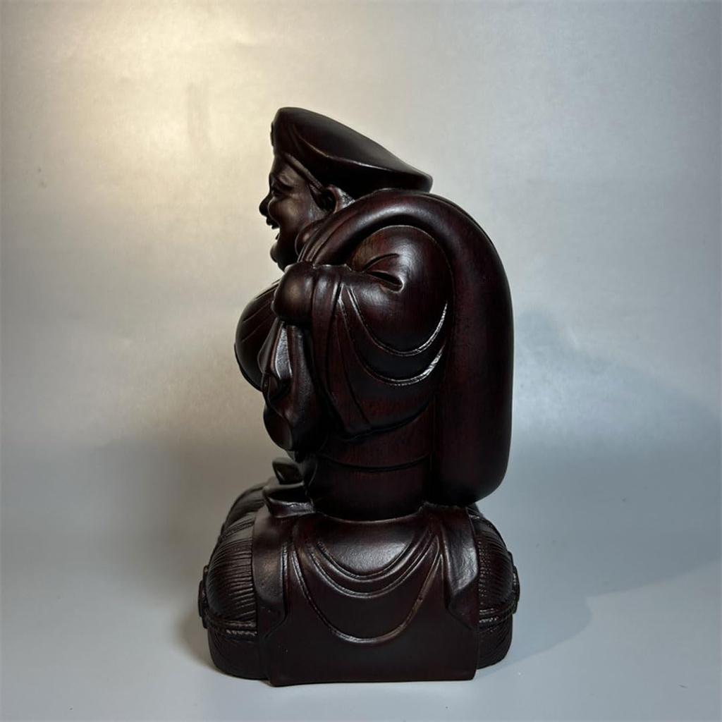 Daikokuten, einer der Sieben Glücksgötter, ist eine Holzfigur von Daikokuten, gefertigt aus Ebenholz. Diese Holzstatue ist ein Talisman für geschäftlichen Wohlstand,