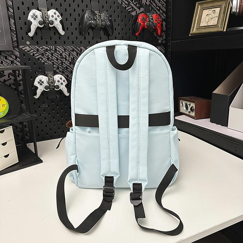 School bag Korean version couple simple large-capacity backpack leisure commuting college student school bag niche light travel backpack