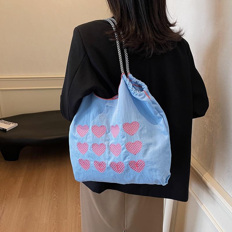Personality trendy bag, foreign casual bag, women's 2025 new trendy Korean version of the college tote bag, large-capacity handbag