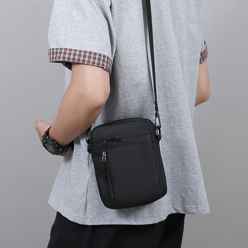 New Men's Shoulder Bag Nylon Lightweight Joker Mobile Phone Bag Women's Fashion Simple Travel Messenger Bag.