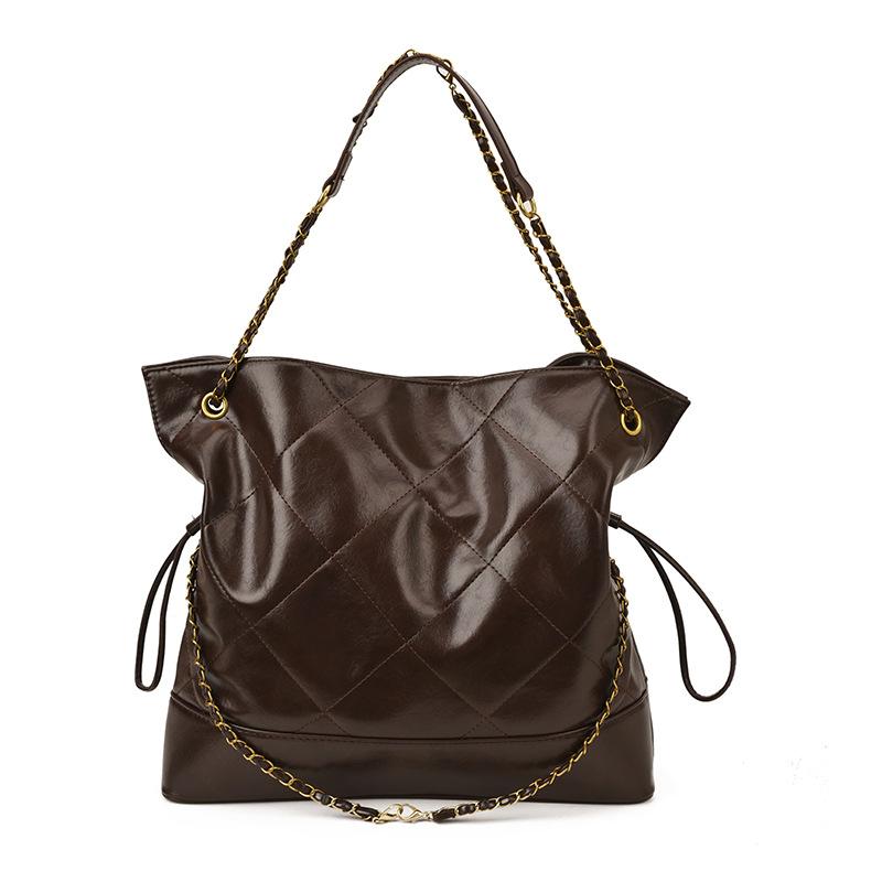 

Korean version of commuter one-shoulder armpit bag diamond chain versatile tote bag women s 2025 new three-purpose casual backpack