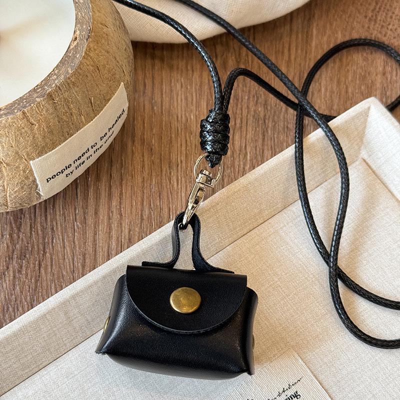 Retro Leather Coin & Earphone Pouch Necklace - Versatile Commuting Sweater Chain, High-End Jewelry.