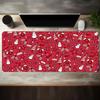 A Large Gaming Mouse Pad Featuring a ChristmasThemed Red Background with Full Print Design Equipped with a NonSlip