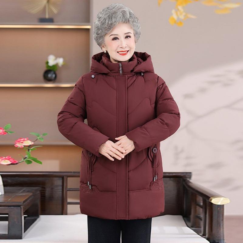 Gepolsterte Baumwollkleidung Damen neue lange abnehmbare Mütze diesen Winter Große Größe lockere Baumwoll-Steppjacke Oberteil